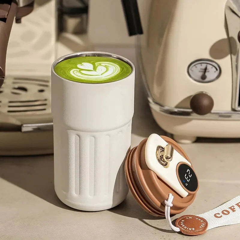 Insulated stainless steel mug with temperature display